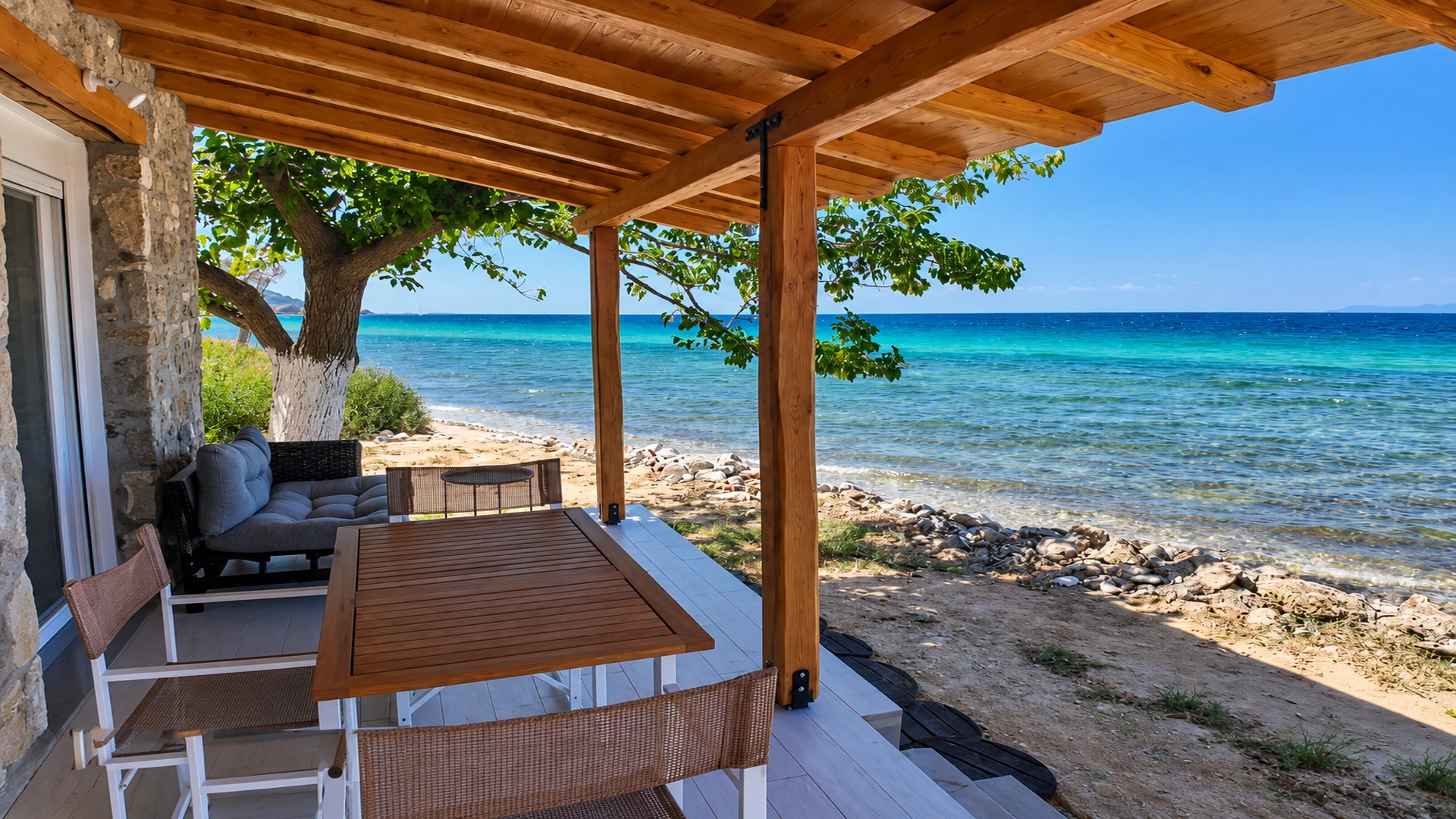 Dining terrace next to the Aegean Sea